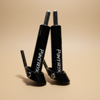 Black Pintryx drop set pins upside down on beige background.