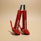 Red Pintryx drop set pins upside down on beige background.